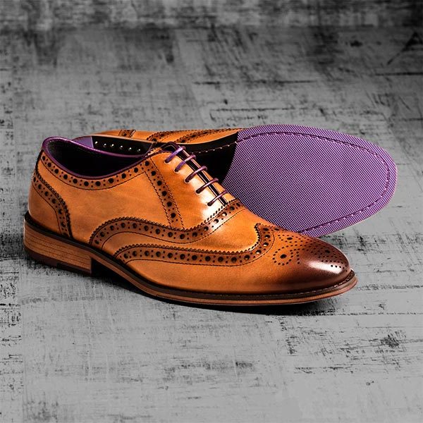 tan and black brogues
